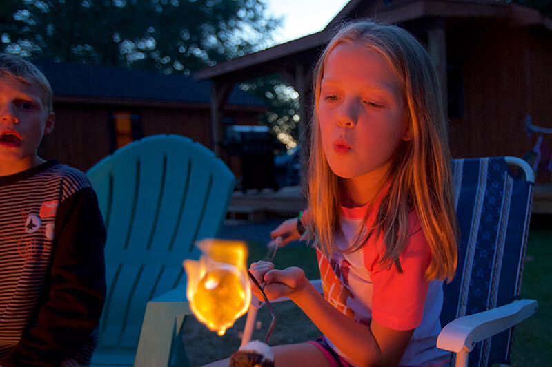 Child roasting marshmallow